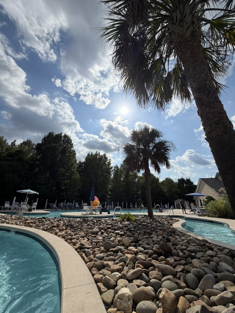 Floating the lazy river under the palms